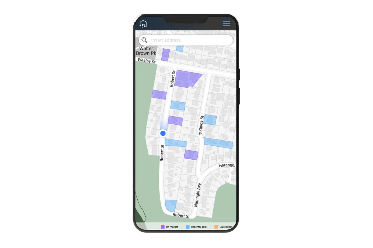 A street map with an address search bar, coloured overlays marking properties on market, recently sold and on request, and a pin dropped on the user's current location on Robert St